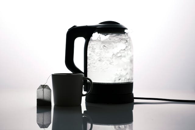 Kettle boiling on a kitchen counter